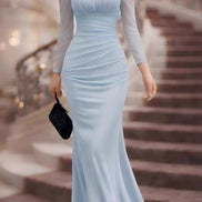 Vestido Maxi Negro con Halter y Manga Transparente