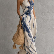 Mono de corte ancho con cuello halter, estampado difuminado y bolsillos