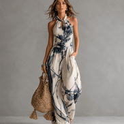 Mono de corte ancho con cuello halter, estampado difuminado y bolsillos