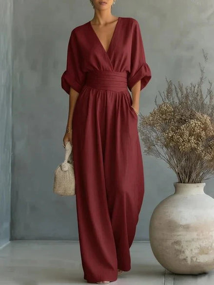Elegante mono holgado de cuello en V y talle alto. STOCK