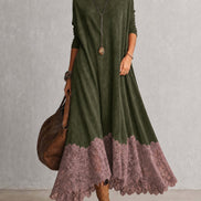 Vestido evasé de cuello alto con paneles de encaje y manga larga