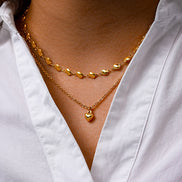 Collar con colgante de corazón de alivio