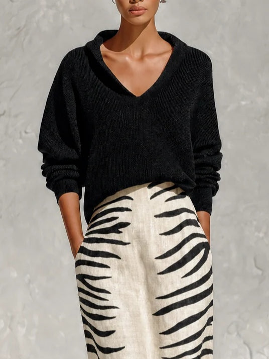 Conjunto Negro de Top de Punto y Falda Midi de Cebra