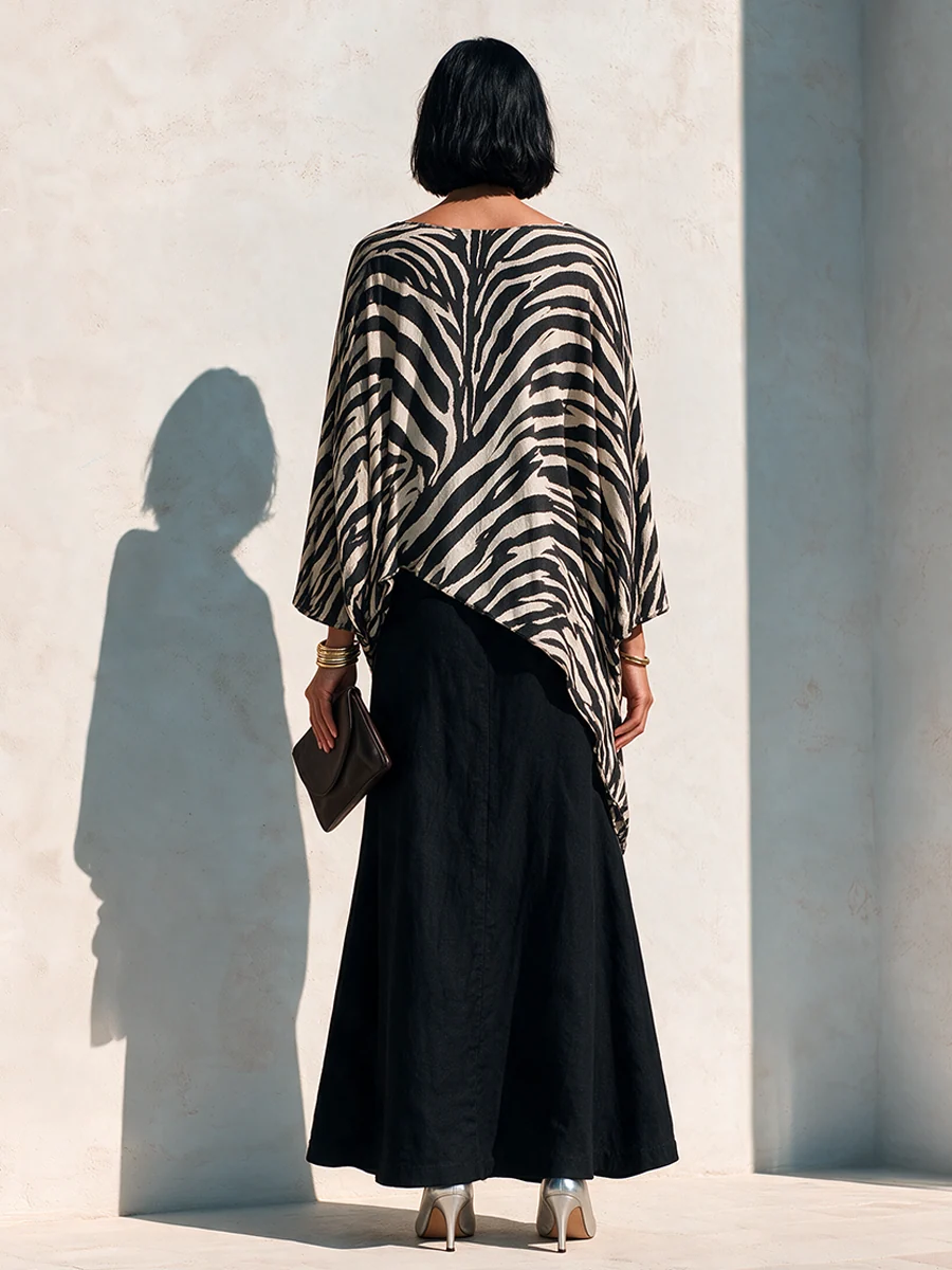 Conjunto de Top Asimétrico de Cebra y Falda Negra Drapeada