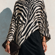 Conjunto de Top Asimétrico de Cebra y Falda Negra Drapeada