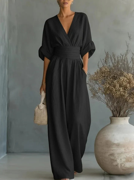 Elegante mono holgado de cuello en V y talle alto. STOCK